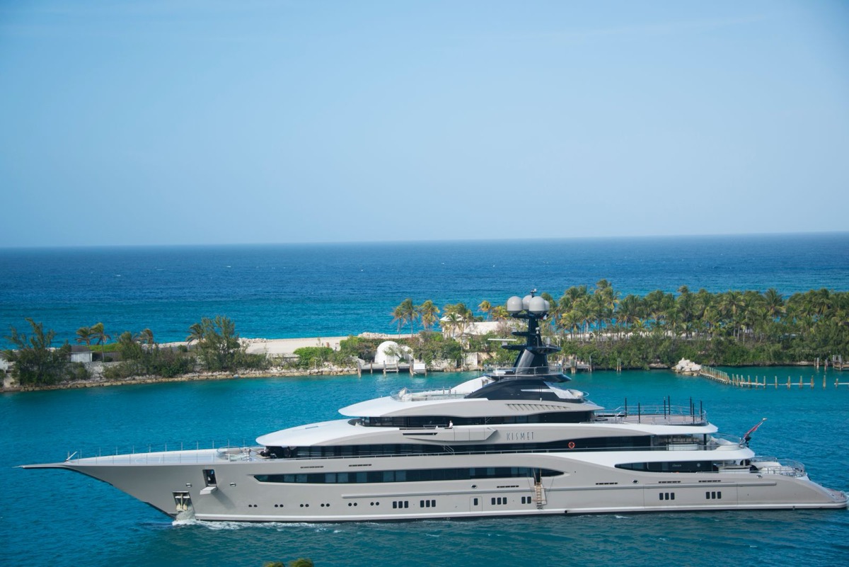 Superyacht at anchor in a turquoise bay